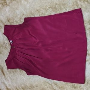 Burgundy/Wine blouse. Gently worn, 1 small stain on back. Button closure.
